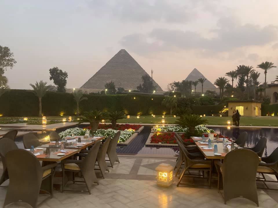 the pyramids view from Marriott Mena House Restaurant